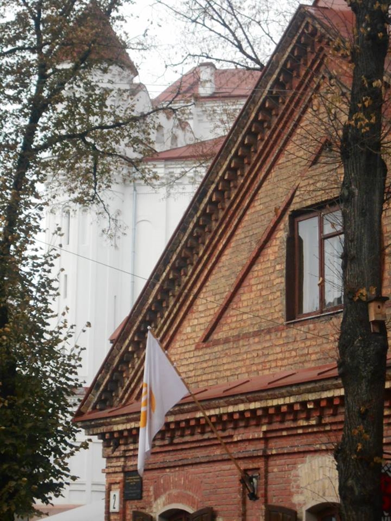 Corner of Uzhupis cafe-parliament with a flag